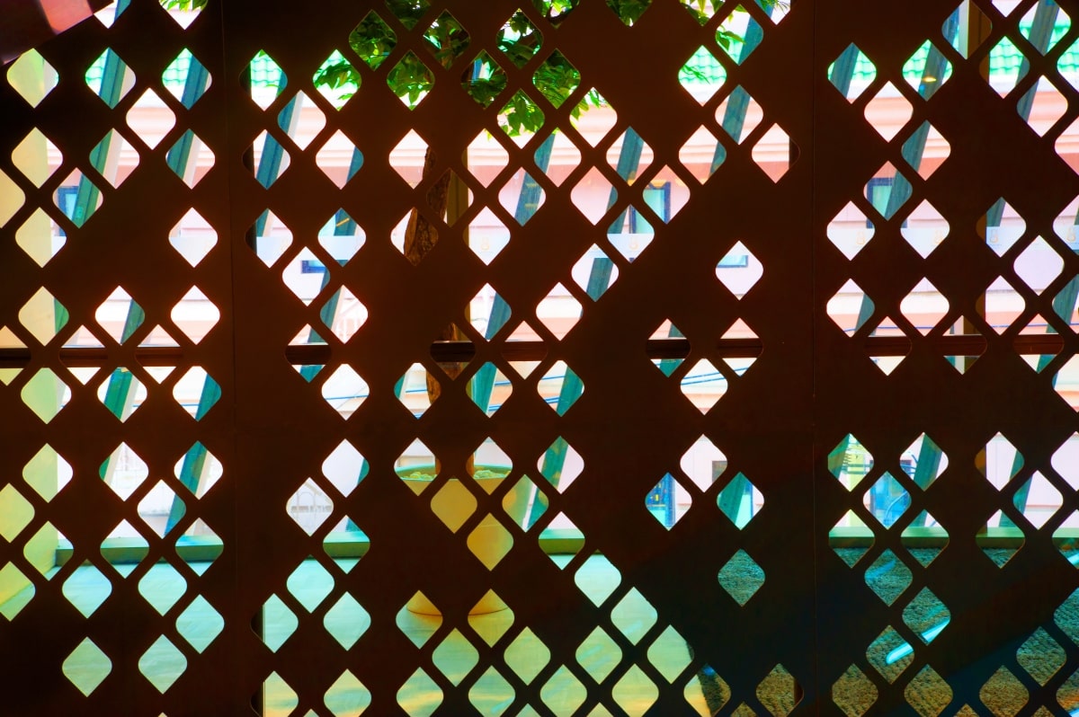 Perforated, punched metal decorative screen.