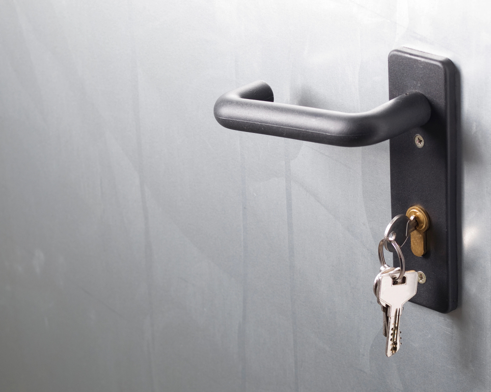 Keys in the lock of a secure door in a home