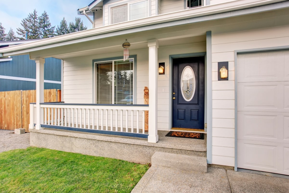 Traditional home with blue front door.