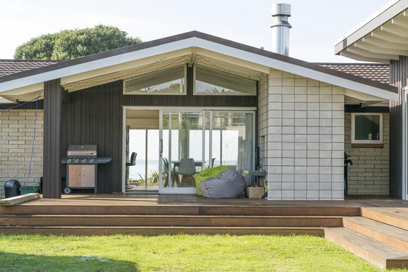 House with security doors near the ocean